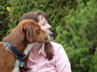 Lipreading Mom Guest Blogger Denise Portis along with her service dog, Chloe, pose for Show Me Your Ears.