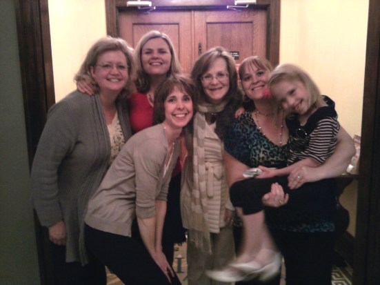 In February, a caravan of friends and family drove with me to Atchison, Kansas, at my speaking event for the first-ever Grace & Girlfriends women's retreat. Live captioning was provided by volunteer/friend Donna (kneeling, front). Do you spot Lipreading Mom standing on tiptoes in the back?