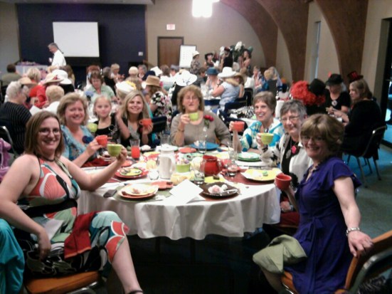 The first-ever Deaf Women's Tea was held in Kansas. My table mates consisted of sign language interpreters, Kansas School for the Deaf staff...and my darling little girl. This was my first experience with having a sign language interpreter devoted strictly to communicating with me.