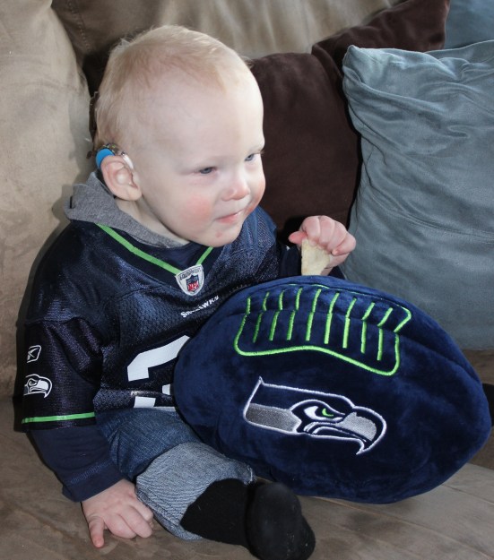 Young Jaxson with his cochlear implant